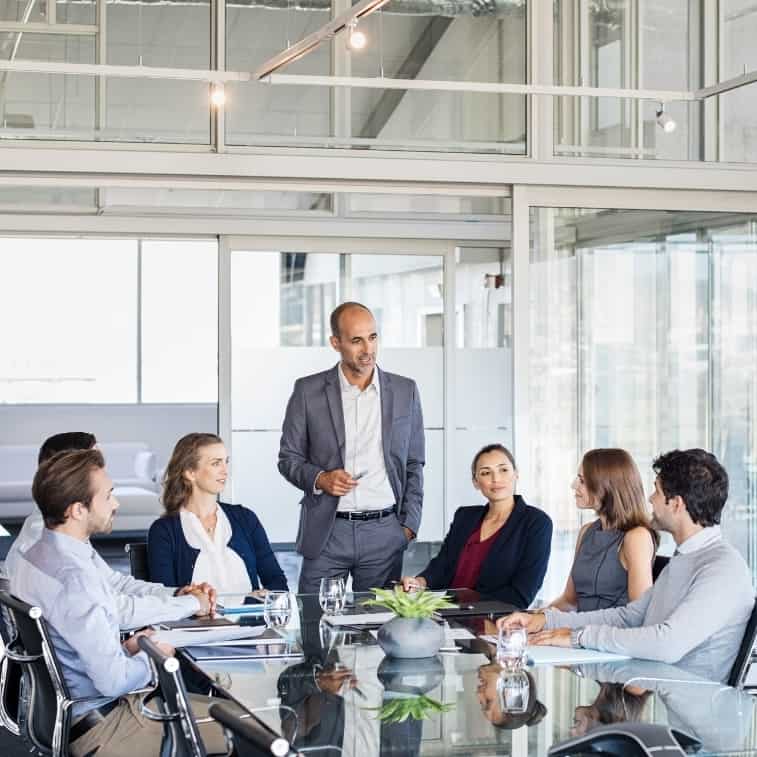 board member sitting around a table discussing