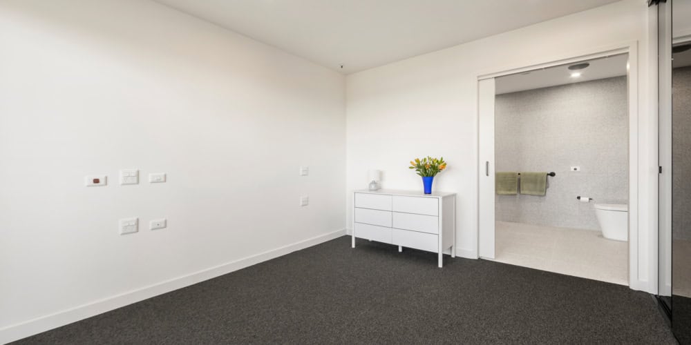 Esen bedroom looking towards bathroom