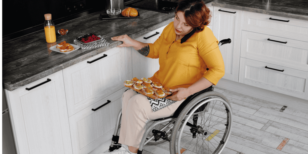 woman in wheelchair in her kitchecn